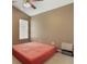 Bedroom featuring tile flooring, a window and neutral paint at 2912 Lazlo Ln, Orlando, FL 32837