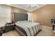 Bedroom featuring tile flooring, ceiling fan, and neutral color palette at 2912 Lazlo Ln, Orlando, FL 32837