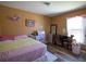 Comfortable bedroom with a colorful decor, a window, and plenty of natural light at 3030 Eagle Crossing Dr, Kissimmee, FL 34746