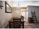 Dining area featuring hardwood floors and lots of natural light at 3030 Eagle Crossing Dr, Kissimmee, FL 34746
