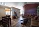 Inviting living room featuring hardwood floors and comfortable seating arrangement at 3030 Eagle Crossing Dr, Kissimmee, FL 34746
