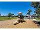 Community playground with slides and play area, providing a fun space for children to play at 3030 Eagle Crossing Dr, Kissimmee, FL 34746