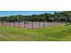 Community tennis court providing recreational space for residents to enjoy outdoor activities at 3030 Eagle Crossing Dr, Kissimmee, FL 34746