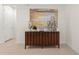 Modern dining room decor with glass display case and beach themed painting at 340 Pendant Ct, Kissimmee, FL 34747