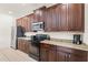 Well-equipped kitchen with granite countertops, sleek appliances, and ample cabinet space at 340 Pendant Ct, Kissimmee, FL 34747