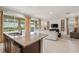 A view of the living room seen from the kitchen island at 340 Pendant Ct, Kissimmee, FL 34747