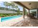 Backyard pool and patio is perfect for relaxing or entertaining at 340 Pendant Ct, Kissimmee, FL 34747