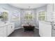 Bathroom features a clawfoot tub, double vanity, and windows providing natural light at 3427 Harborside Ct, Kissimmee, FL 34746
