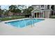 Community pool next to neighborhood buildings at 4728 Walden Cir # 32, Orlando, FL 32811