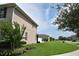 Well-manicured yard and home exterior at 4800 Riverwalk Dr, St Cloud, FL 34771