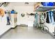 Spacious garage with ample storage, work space, and epoxy flooring at 4800 Riverwalk Dr, St Cloud, FL 34771