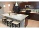 Updated kitchen with a large island, stainless steel appliances, and ample cabinet space at 4800 Riverwalk Dr, St Cloud, FL 34771