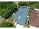 Overhead view showcasing the home's roof, yard, and the screened-in pool area at 4903 Santa Clara Dr, Orlando, FL 32837