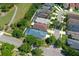 Aerial view showcases the home, the screened pool, with other residential properties and streets at 4903 Santa Clara Dr, Orlando, FL 32837