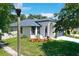 Well-maintained single-story home with an inviting entrance, tasteful landscaping, and a two-car garage at 4903 Santa Clara Dr, Orlando, FL 32837