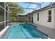 Inviting screened pool area with a view of the lush landscaping and backyard at 4903 Santa Clara Dr, Orlando, FL 32837