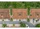 Bird's eye view of the townhome complex shows beautiful architecture and green surroundings at 7667 Sugar Bend Dr # 7667, Orlando, FL 32819