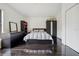 Bright bedroom featuring a dresser and closet at 7667 Sugar Bend Dr # 7667, Orlando, FL 32819
