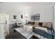 Spacious open living area with modern furnishings and hardwood floors at 7667 Sugar Bend Dr # 7667, Orlando, FL 32819