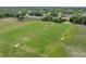 Wide aerial view of a well-maintained soccer field, ready for play with soccer goals at 7667 Sugar Bend Dr # 7667, Orlando, FL 32819