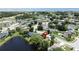 The aerial view highlights the home's desirable location with lake access in a beautiful neighborhood at 86 Blackberry Creek Dr, St Cloud, FL 34769