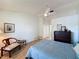 Spacious bedroom with vaulted ceilings, a ceiling fan, and a neutral color palette at 86 Blackberry Creek Dr, St Cloud, FL 34769