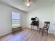 Spare bedroom with ample sunlight and a ceiling fan provides a versatile space at 86 Blackberry Creek Dr, St Cloud, FL 34769
