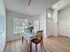 Bright dining area with natural light, wood floors, and a welcoming atmosphere at 86 Blackberry Creek Dr, St Cloud, FL 34769