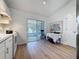 Charming kitchen with a view of the lanai and space for a dining set at 86 Blackberry Creek Dr, St Cloud, FL 34769