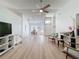 Bright and airy living area with an open layout to the dining room, ideal for entertaining at 86 Blackberry Creek Dr, St Cloud, FL 34769