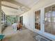 Inviting screened patio with access to the exterior and interior, furnished with table and chairs at 86 Blackberry Creek Dr, St Cloud, FL 34769