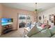Living room featuring sliding glass doors that offer great outdoor views at 906 Berwick Dr, Davenport, FL 33897