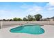 Backyard pool with surrounding fence, decking and seating at 906 Berwick Dr, Davenport, FL 33897