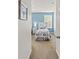 View of a charming bedroom with two twin beds with decorative covers at 9128 Stromboli Ct, Kissimmee, FL 34747