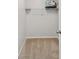 A gray walk-in closet with neutral carpet and a wire shelf at 9128 Stromboli Ct, Kissimmee, FL 34747