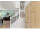 Inviting foyer with staircase, offering a glimpse into the home's open layout at 9128 Stromboli Ct, Kissimmee, FL 34747