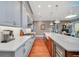 Bright, open kitchen featuring stainless steel appliances, a spacious island, and ample countertop space at 10836 Royal Cypress Way, Orlando, FL 32836