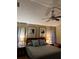 Inviting bedroom with neutral colors, soft lighting, and comfortable bedding, ideal for restful nights at 11922 Ottawa Ave, Orlando, FL 32837