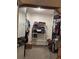 A walk-in closet offering ample space with mirrored doors for easy access to your wardrobe at 11922 Ottawa Ave, Orlando, FL 32837