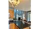 Open-concept kitchen view showcases granite counters and a fireplace, enhancing the home's cozy, inviting feel at 11922 Ottawa Ave, Orlando, FL 32837