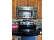 Stainless steel Whirlpool microwave oven with range and backsplash offering modern amenities and practicality at 11922 Ottawa Ave, Orlando, FL 32837