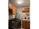 Well-equipped laundry room features modern washer, dryer, and convenient storage cabinets at 11922 Ottawa Ave, Orlando, FL 32837