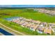 Gorgeous aerial view of a residential neighborhood featuring beautiful homes and lush green spaces at 13809 Abberwick Dr, Orlando, FL 32832