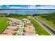 Stunning aerial view of the neighborhood with a beautiful lake in the background at 13809 Abberwick Dr, Orlando, FL 32832