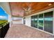 Enjoy outdoor living on this home's private balcony with sliding glass doors and scenic views at 13809 Abberwick Dr, Orlando, FL 32832