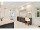 This is a beautifully designed bathroom with granite counters, a sliding barn door, and a serene, spa-like atmosphere at 13809 Abberwick Dr, Orlando, FL 32832