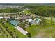 Beautiful community pool and amenities including tennis court, bocce ball, and a clubhouse at 17795 Blazing Star Cir, Clermont, FL 34714