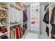 Organized walk-in closet with custom shelving, drawers, and ample storage at 17795 Blazing Star Cir, Clermont, FL 34714