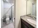 Bathroom featuring tile floors, granite countertops and a glass shower at 1876 Summer Dr, Davenport, FL 33897