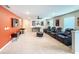 Spacious upstairs bonus room featuring home theater seating and game table for Gathering fun at 1876 Summer Dr, Davenport, FL 33897